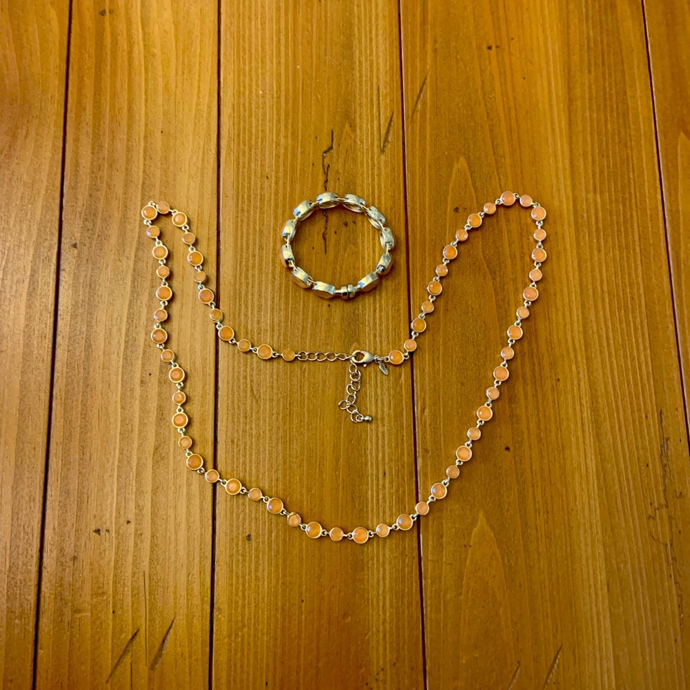 Chico’s necklace. Approximately 22” long.  It is adjustable.  Matching bracelet